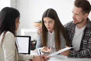 Couple and lawyer in a meeting