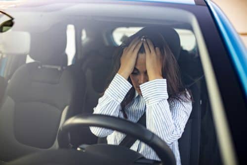 A Louisiana woman feeling stressed after a car accident. 